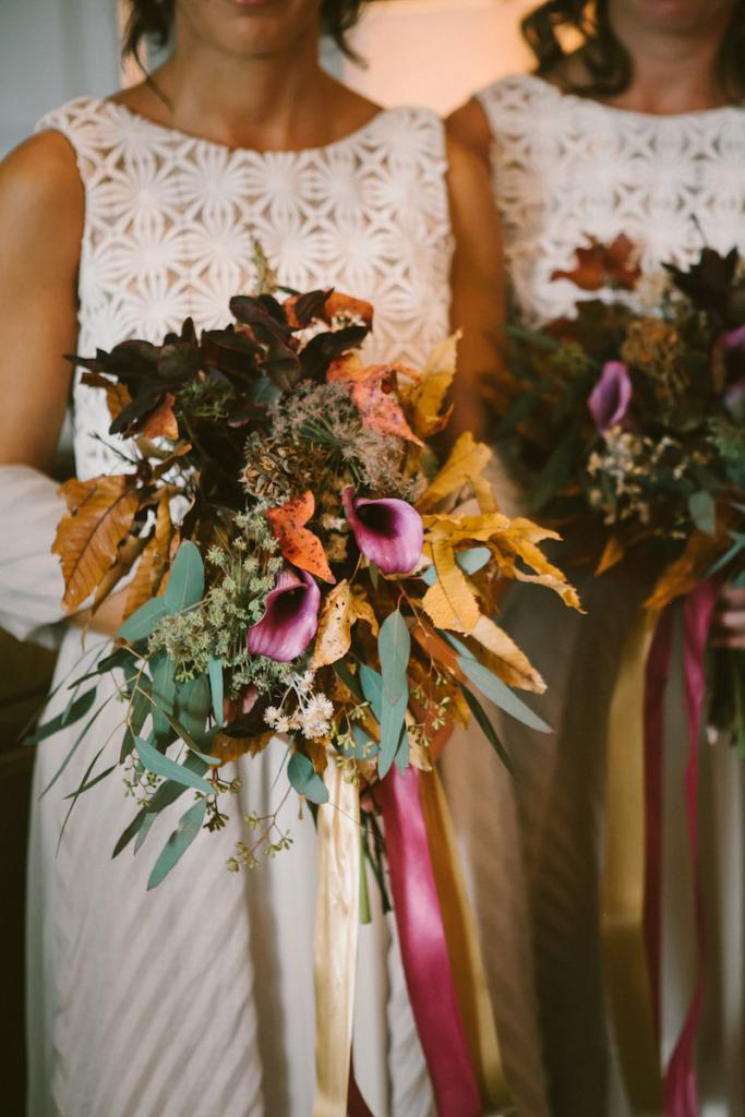 Bridesmaids’ dresses by Lela Rose (available locally through Bella Bridesmaids). Bouquets and photograph by Mark Williams Studio.