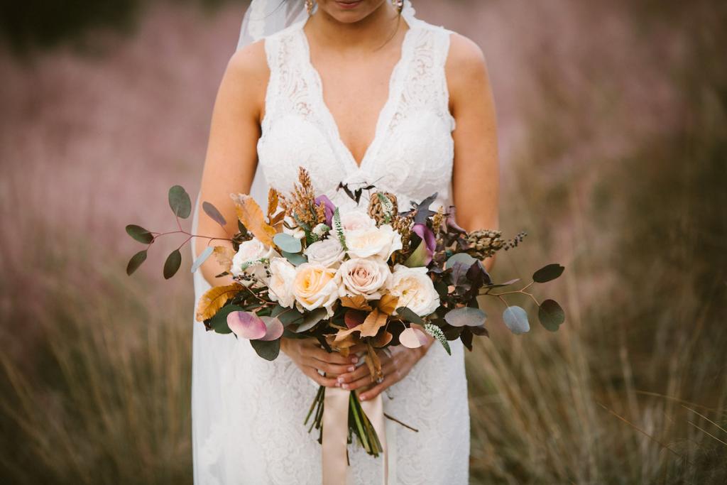 Bride&#039;s gown by Watters from Jean&#039;s Bridal. Veil from Bridal House of Charleston. Bouquet and photograph by Mark Williams Studio at the Daniel Island Club.