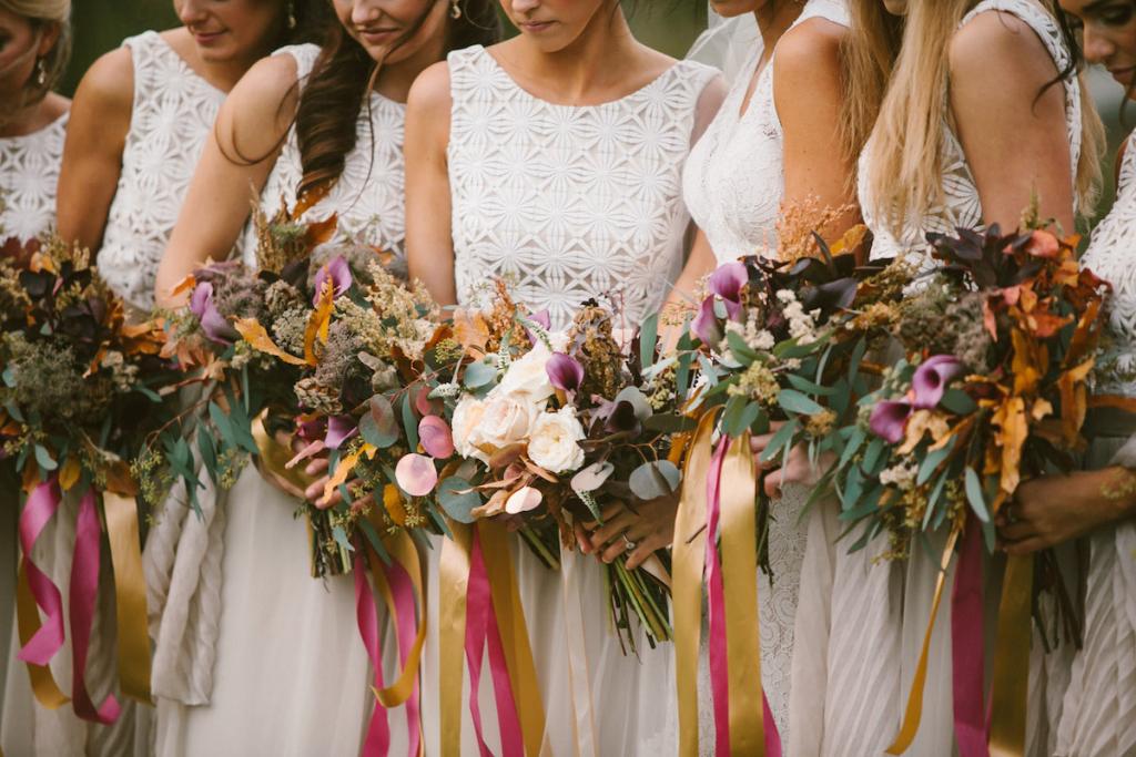 Bridesmaids&#039; dresses by Lela Rose (available locally through Bella Bridesmaids). Florals and photograph by Mark Williams Studio at the Daniel Island Club.