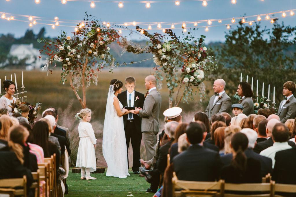 Bistro lights from Charleston Uplighting. Wedding design and photograph by Mark Williams Studio at the Daniel Island Club.