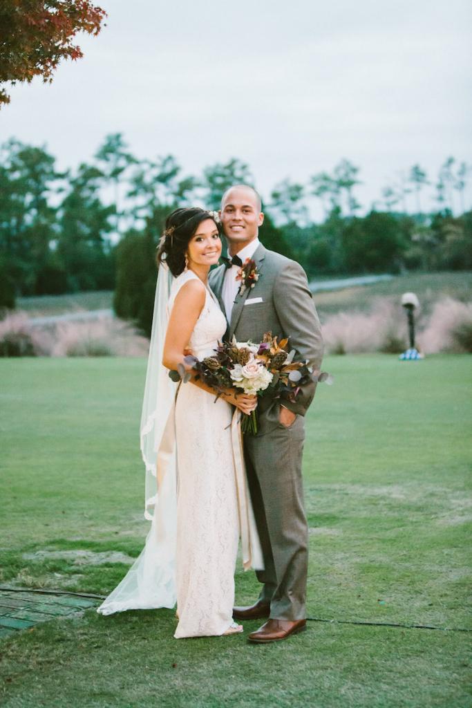 Bride&#039;s gown by Watters from Jean&#039;s Bridal. Veil from Bridal House of Charleston. Groom&#039;s suit from Jos. A. Bank. Bow tie by Brackish. Florals and photograph by Mark Williams Studio at the Daniel Island Club.