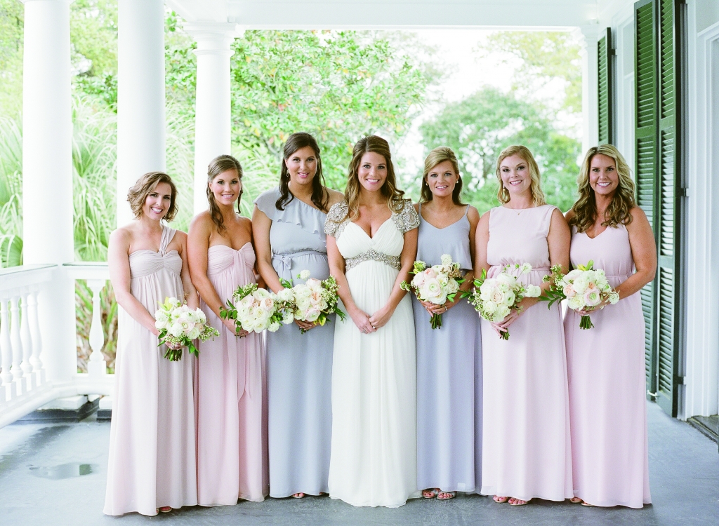 Bridesmaids chose their own blush or beige Joanna August frocks while Meggie’s maids of honor wore pale gray. &lt;i&gt;Image by Lucy Cuneo Photography&lt;/i&gt;
