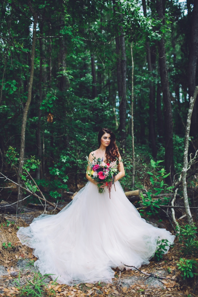 Bridal attire by Lazaro from Gown Boutique of Charleston. Bouquet by Anna Bella Florals. Image by Monika Gauthier Photography &amp; Design at The Stables at Boals Farm.