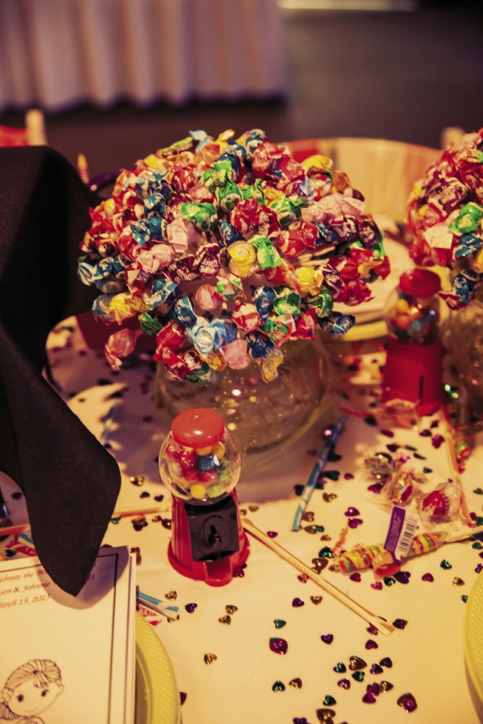 CANDY LAND: The bride made lollipop centerpieces for the children’s table.