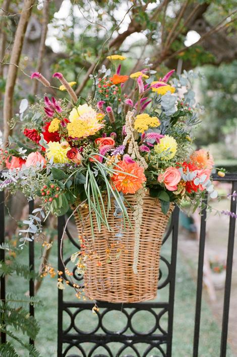 AUTUMN&#039;S BOUNTY: A friend of the bride&#039;s family, Sue Jordan, created earthy arrangements full of autumn-hued buds. &quot;I wanted the flowers to look like they came straight from the garden,&quot; says Allison.