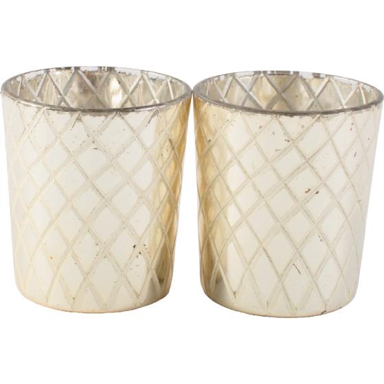 3. LIGHTEN UP WITH VOTIVES: To add sparkle while pulling in cool, Celtic silver, mercury glass votives will sit in clusters on various surfaces. (Votives: One Kings Lane)