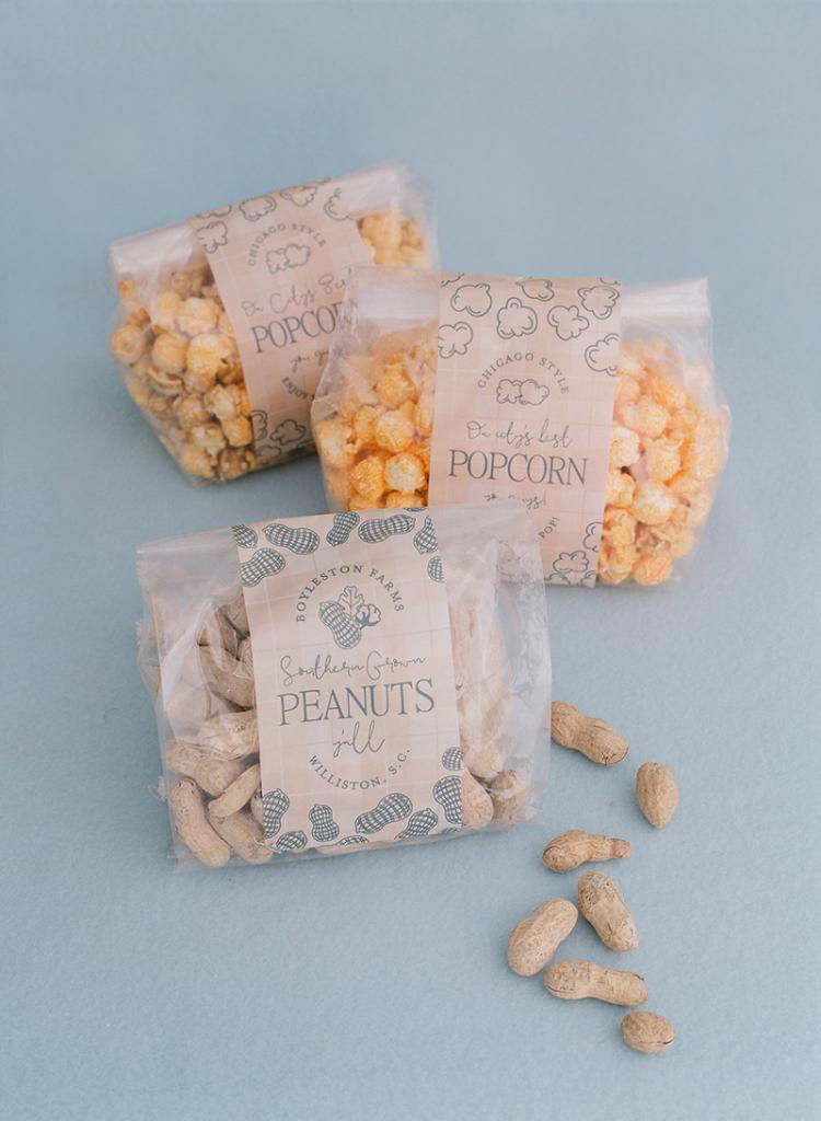 Favors included peanuts from the groom’s family farm and Rewined candles, bought in bulk at the local brand’s annual warehouse sale. Bridesmaids were gifted candles with custom labels.